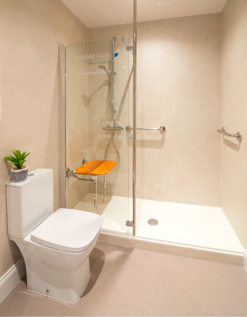 Large walk in shower with sit down shower facility